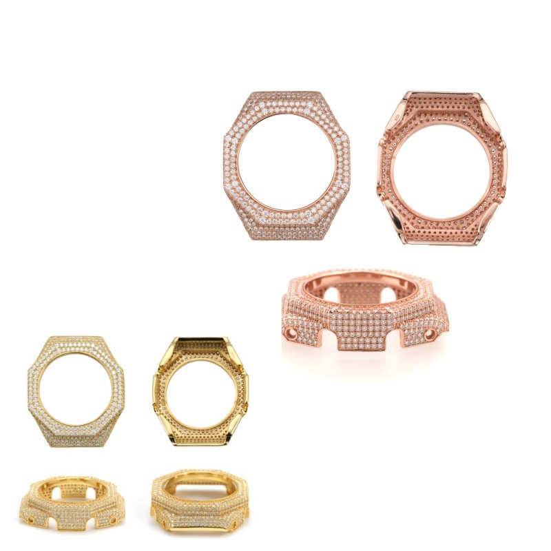 Set of gold and rose gold hexagonal watch cases on a white background